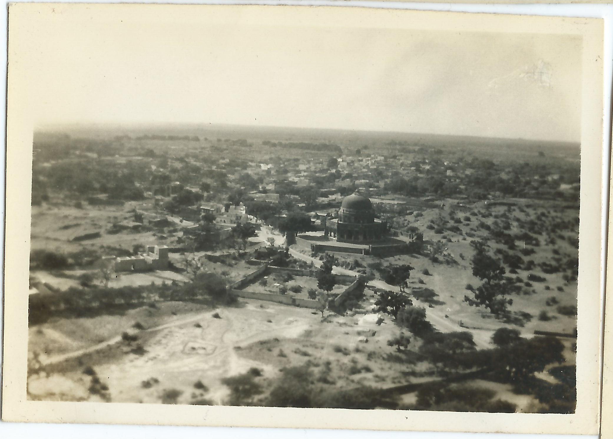 A photo of Adham Khan's Tomb in Mehrauli taken from the top of Qutub Minar, early 1940s. Photo by Narain Prasad