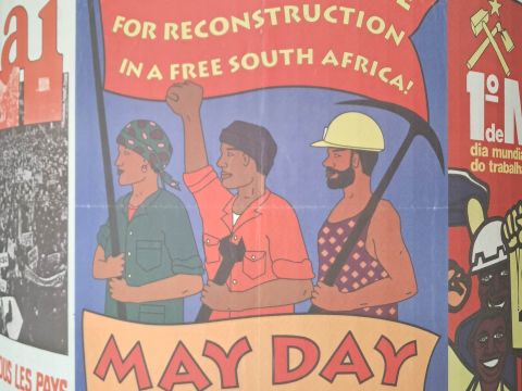 A "May Day" or "Worker's Day" poster inside the IISH building. The holiday celebrates the role trade unions and other labour movements played in equal employment standards in South Africa. Photo Credit: Meera Venkatachalam