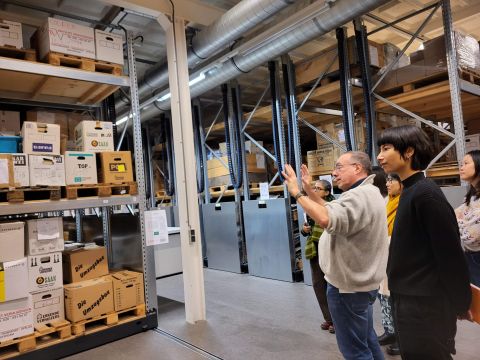 Eef Vermeij, the IISH Asia Collections Coordinator, showing the IIAS group the first stage of the collection process: the receiving and arrival of new materials