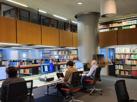 People sitting inside the IISH library. The library and its resources on social movements are available for free for everyone to access and use. Photo Credit: Enrico Joaquin Lapuz