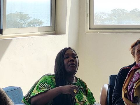 Carole Diop discussing the architectural history of Dakar in the roundtable. Carole brought her book for participants to read, as well as conducted city walking tours as part of the AA3 festivities.