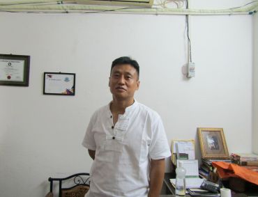 Dr. Akum Longchari